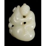A Chinese carved white jade pendant: in the form of a boy seated on and clasping a giant gourd,