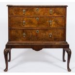 An 18th Century walnut chest of small size on later stand:,