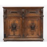 A 17th Century oak side cupboard:, with a moulded top,