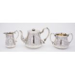 A Victorian silver presentation three-piece tea service, maker Robert Harper, London,