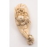 A Japanese carved ivory netsuke,