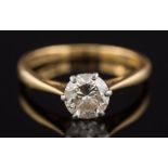 An 18ct gold and diamond single-stone ring: with circular brilliant-cut stone approximately 6.