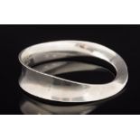 Georg Jensen. A 'Georg Jensen' wavy bangle: stamped 'Georg Jensen, 925S Denmark, 206 Torun M'.