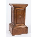 An Edwardian walnut square table top coin cabinet:, having sixteen interior fitted sliding trays,