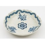 A Worcester blue and white junket dish: moulded with foliage and trellis,