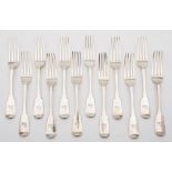 A set of eleven Victorian silver Fiddle pattern table forks, maker George Adams, London,