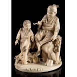 A Japanese carved ivory sectional okimono of a fisherman and child: beside a river looking after