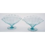 A pair of fan shaped glass vases by Harry Powell for Whitefriars: the pale blue body with wavy rim