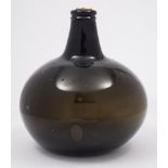 A Dutch magnum onion shaped wine or spirit bottle: the mid to dark green bottle with pontil mark