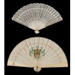 A 19th century Chinese bone brise fan: with pierced stick and guards, 21cm.