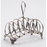 A Victorian silver six division toast rack, maker John Evans II, London,