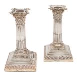 A pair of Edward VII silver desk candlesticks, maker William Hutton & Sons Ltd, London,
