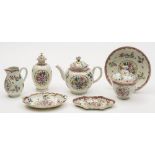 A First Period Worcester part tea service: decorated in the Chinese export style in famille rose