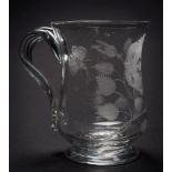 A mid 18th century glass baluster mug: of possible Jacobite significance, with ribbed strap handle,