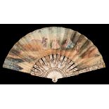 A 19th century bone and gilt decorated fan: the paper leaf decorated to one side with young lovers