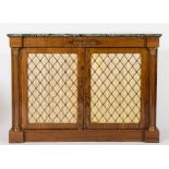 A pair of rosewood and brass inlaid breakfront side cabinets in the Regency taste:,