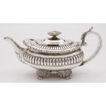 A George III silver teapot, maker's mark rubbed, London, 1818: initialled and inscribed,