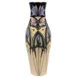 A Moorcroft pottery vase: of slender oviform tubelined in the Sweet Harmony pattern after an