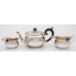 A George V silver three-piece tea service, maker George Howson, Sheffield,