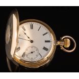 A gentleman's 18ct gold quarter repeat pocket watch: the circular white enamel dial,