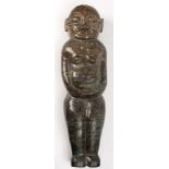 A large hardstone carving of a fertility figure,