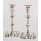 A pair of George III cast silver candlesticks, maker William Cripps, London,