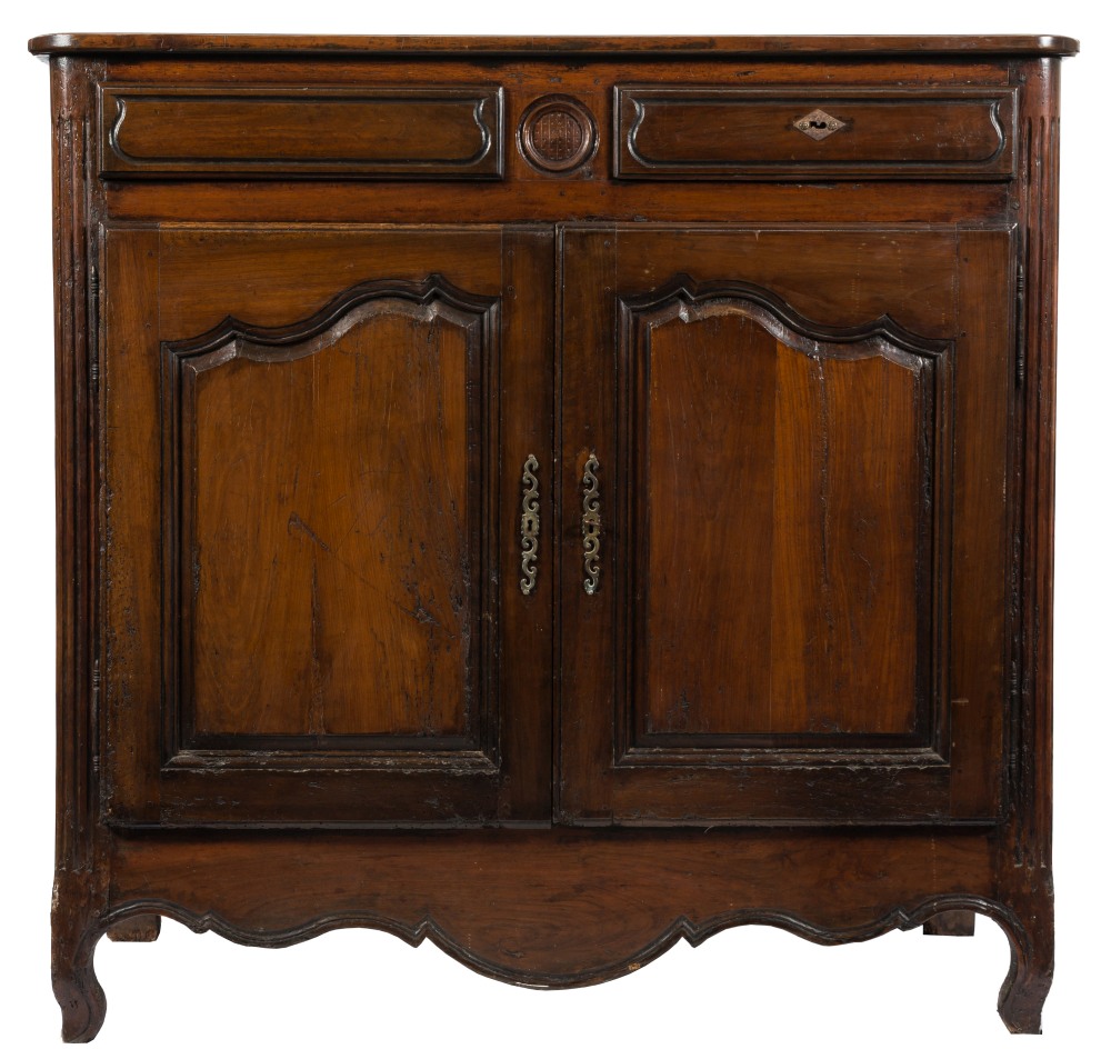 An 18th Century French Provincial walnut side cupboard:,