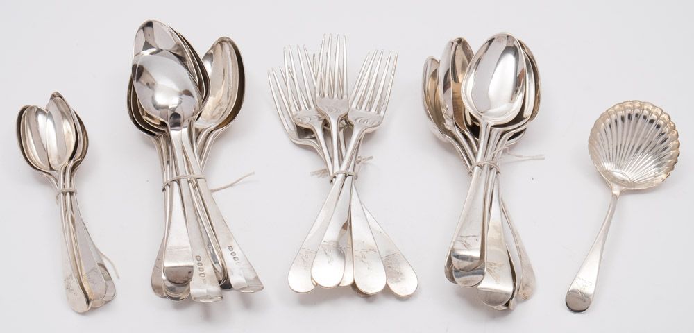 A matched silver Old English pattern part flatware service, various makers and dates: crested,