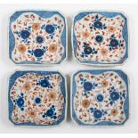 A set of four Chinese Imari square section dishes: painted in underglaze blue,