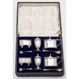 A matched six-piece condiment set, various makers and dates: of oval outline with reeded borders,