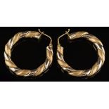 A pair of 18ct gold bi-coloured 'candy twist' design hoop earrings:, 37mm diameter, 15.