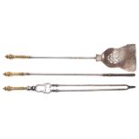 A set of three 19th century steel and brass fire implements: the brass handles with knopped and