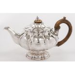 A George IV silver teapot, maker Benjamin Preston, London, 1825: monogrammed and crested,