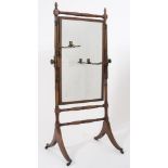 A Regency mahogany swing frame cheval mirror:,
