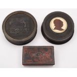 A 19th century pressed horn snuff box: of circular outline,