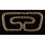 An 18ct gold bi-colour, spiga pattern chain:, 45cm total length, 33gms gross weight.