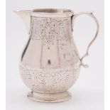 A George II silver cream jug, maker WS, London,