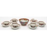 A set of six Chinese famille rose teabowls and saucers and a similar bowl: the teabowls and saucers