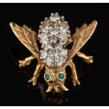 A diamond and emerald-set 'bee' brooch: with circular brilliant-cut diamonds estimated to weigh a