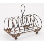 A George III silver six division wirework toast rack, maker William Bennett,