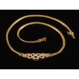 An 18ct gold and diamond entrelac design necklace: 40cm long, 21.5gms gross weight.