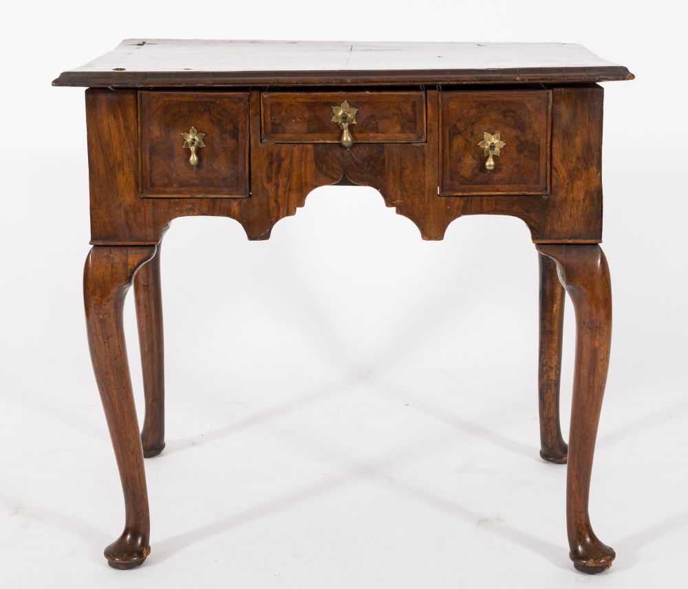 An early 18th century walnut and cross and feather banded rectangular side table:,