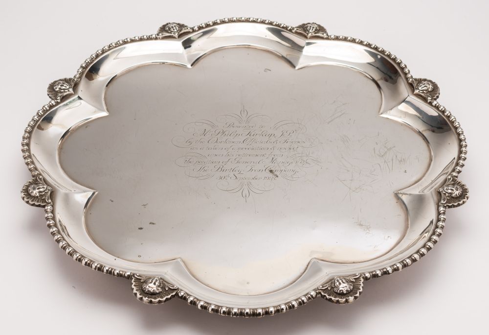 A George V Irish silver presentation salver, maker Reid & Sons, Dublin, 1915: inscribed,