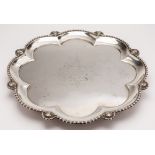 A George V Irish silver presentation salver, maker Reid & Sons, Dublin, 1915: inscribed,