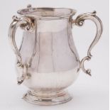 A George V silver three-handled tyg, maker Garrard and Co, London,