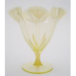 A 'vaseline' glass vase by Harry Powell for Whitefriars: the yellow tinged body with foliate