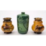 Three George Jones vases: comprising a Pompeian cylinder vase printed with flowers and foliage on a