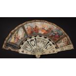 A late 18th/early 19th century Continental carved ivory fan: the paper leaf decorated with a