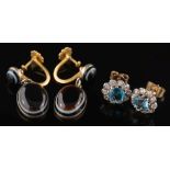 A pair of aquamarine and diamond circular cluster ear-studs: each with a central round aquamarine