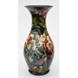 A large Moorcroft pottery vase: of baluster form tubelined in the Hidden Dreams pattern after an